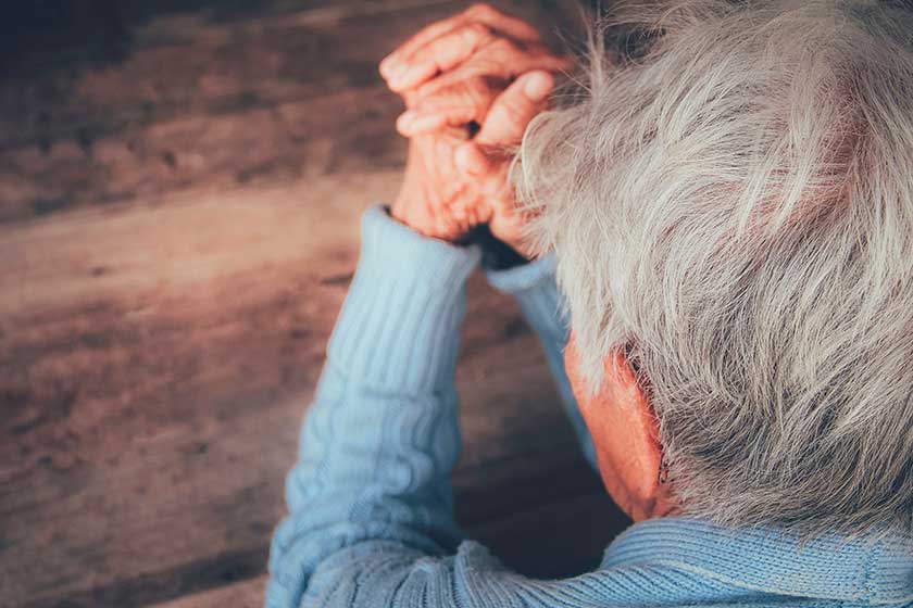 The old person's praying hand