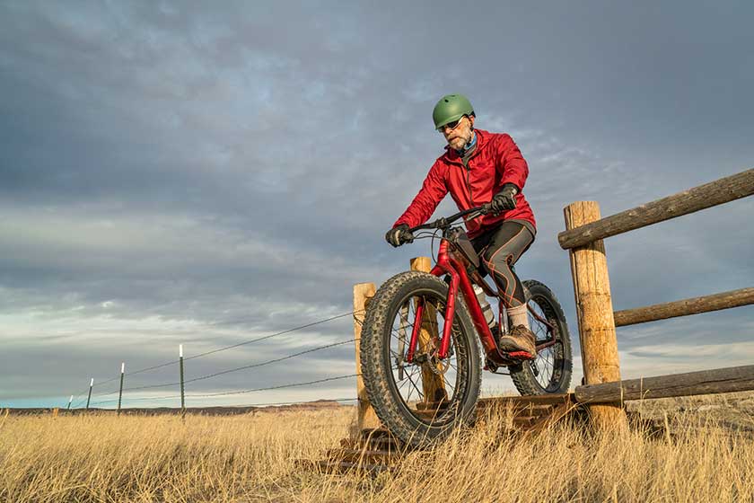 riding a mountain fat bike over cattle guard riding a mountain fat bike over cattle guard