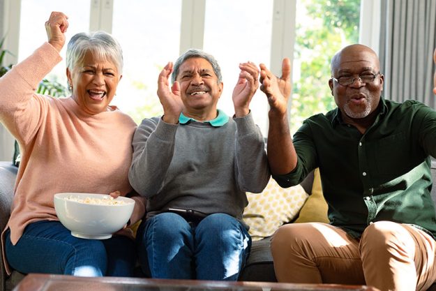 Two happy diverse senior couple and their african male friend Two happy diverse senior couple and their african male friend