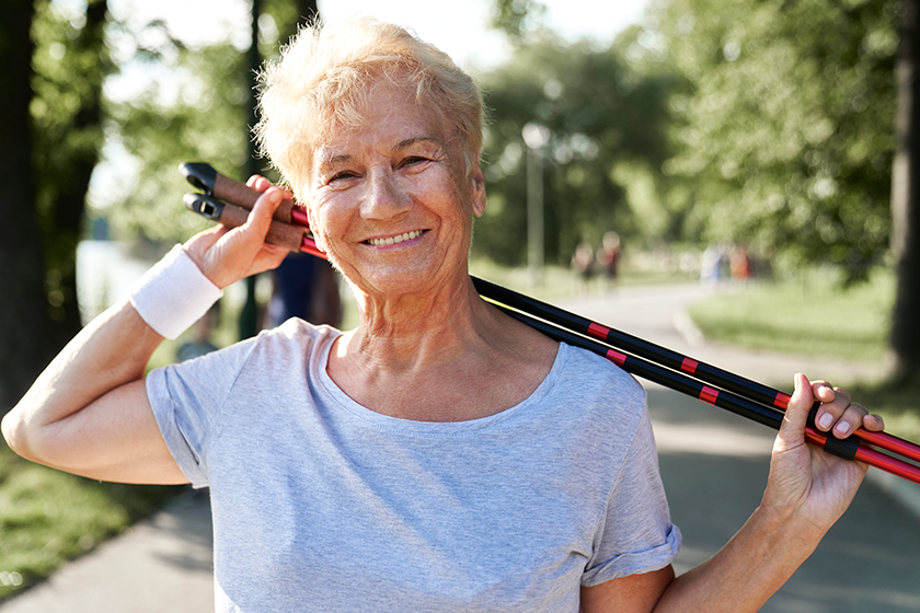 portrait-senior-woman-holding-nordic-walking