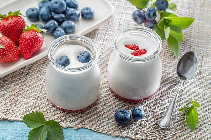 two-glass-containers-plain-yoghurt-berries two-glass-containers-plain-yoghurt-berries
