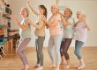 Elderly, yoga and portrait of friends row dance