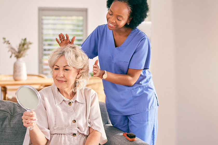 nurse-senior-woman-hair-care Nurse, senior woman and hair care by mirror