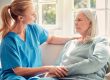 Shot of a senior woman being supported by her nurse