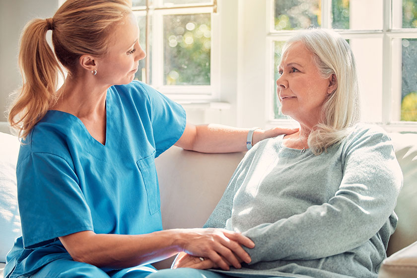 Shot of a senior woman being supported by her nurse Shot of a senior woman being supported by her nurse