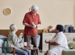 Cozy scene with group of senior people enjoying