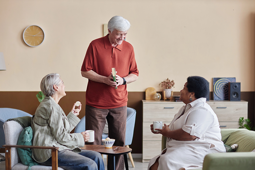 Cozy scene with group of senior people enjoying