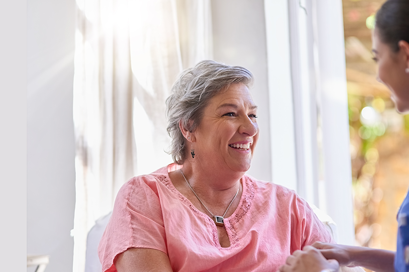 Caregiver, holding hands